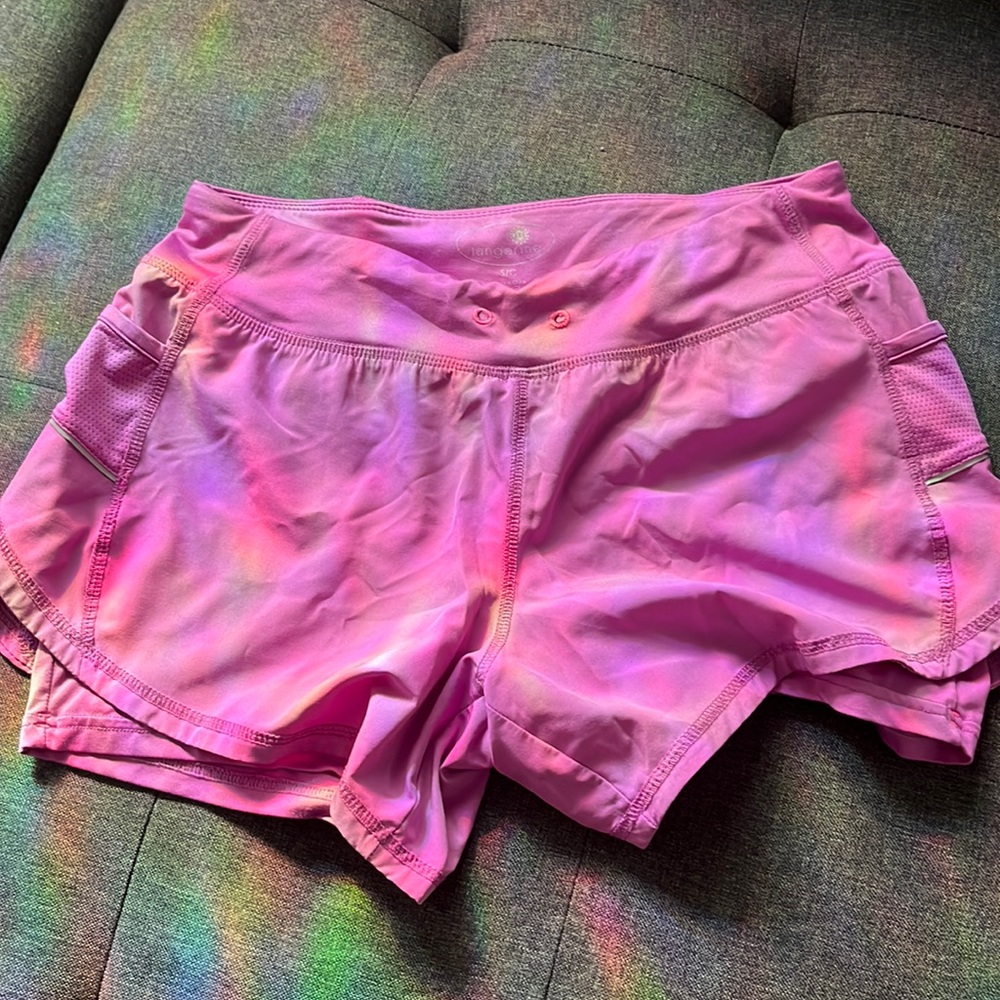 Purple work out shorts with pockets on the side